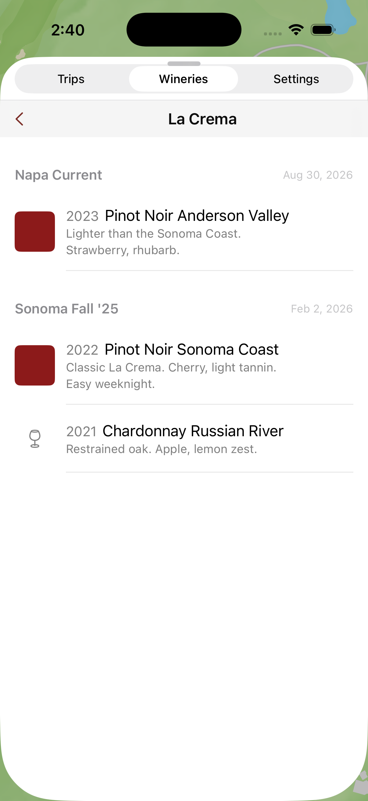 The La Crema page in Vine Trails, showing wines tasted on two separate trips: a 2023 Pinot Noir Anderson Valley from Napa Current in August 2026, and a 2022 Pinot Noir Sonoma Coast and 2021 Chardonnay Russian River from Sonoma Fall 25 in February.